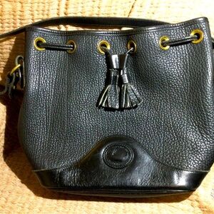 Vintage Dooney and Bourke black pebble leather drawstring bucket bag